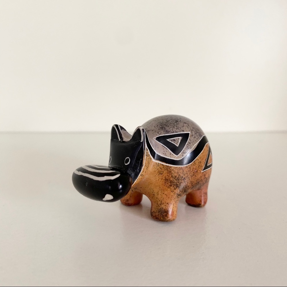 Stone hippo statuette